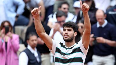 Carlos Alcaraz celebrates after his comfortable win over Giulio Zeppieri at Roland Garros. EPA
