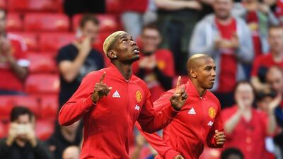 Paul Pogba of Manchester United walks out for the warm up prior to the match on Friday night. Michael Regan / Getty Images / August 19, 2016