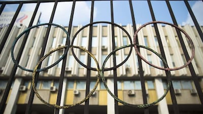 The Olympics rings are seen on a fence in front of the Russian Olympic Committee building in Moscow, Russia, Sunday, July 24, 2016. The IOC has decided against a complete ban on Russian athletes from the Olympics in Rio de Janeiro. Pavel Golovkin / AP Photo
