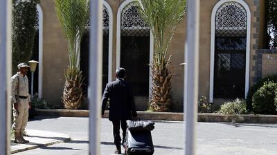A member of a Houthi delegation prepares to fly on a Kuwait-chartered plane accompanied by UN special envoy for Yemen Martin Griffiths and Kuwaiti ambassador to Yemen Fahd Almeie to UN-sponsored peace talks in Sweden, in Sanaa. EPA