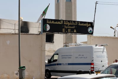A police van enters the premises of the orphanage in the Algiers suburb of Mohammadia, Algeria, on Thursday. EPA