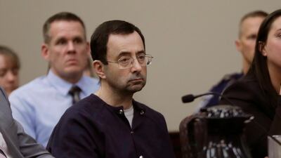 Larry Nassar sits during his sentencing hearing in Lansing, Michigan. AP Photo/Carlos Osorio