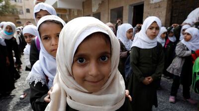 Yemeni schoolgirls line up to do light exercises before attending classes at a primary school in Sana'a, Yemen. EPA