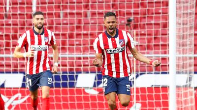 Renan Lodi celebrates scoring Atletico Madrid's equaliser against Osasuna. Reuters