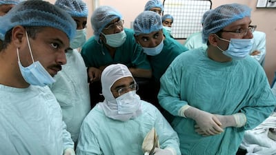 Emirati Red Crescent Society doctors performed many surgeries on Palestinian patients in Gaza City in November 2009. Mahmud Hams / AFP