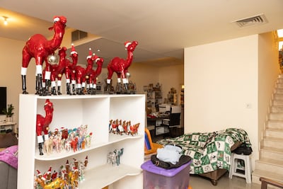 Colourful camels bring a sense of Christmas cheer to the vibrant property. Antonie Robertson / The National