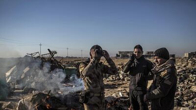 Iraqi Special Forces soldiers on the main road from Erbil to Mosul, in the village of Bartala, Iraq. A senior Iraqi commander says special forces captured a new neighborhood from ISIL militants in eastern Mosul on Wednesday, December 7, 2016 - the latest gain in a massive government military operation now in its seventh week. Manu Brabo / AP