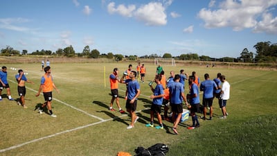 Players of Uruguay's second division club Atletico Torque train in Montevideo, Uruguay in 2017. It's the group's main venture into South America. Reuters