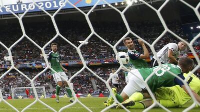 Mario Gomez, right, scores for Germany. REUTERS/John Sibley