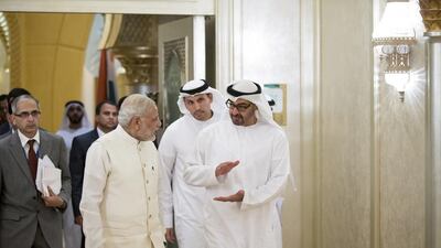 Sheikh Mohammed bin Zayed, Crown Prince of Abu Dhabi and Deputy Supreme Commander of the Armed Forces speaks with Narendra Modi, Prime Minister of India, after a meeting at Emirates Palace, in August. ( Ryan Carter / Crown Prince Court - Abu Dhabi )