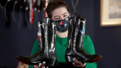A pair of cowboy boots gifted to Prince Philip during a visit to Houston Texas in 1991. Getty Images