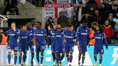 Chelsea's Raheem Sterling, centre, celebrates scoring a free-kick. PA