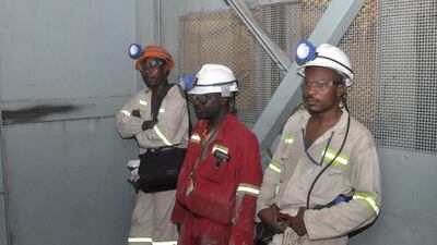 Inside the steel cage that lifts men to and from the surface – without flash photography it is entirely dark. Lonmin is the third largest producer of platinum, operating in the dusty bushveld region of South Africa. Gavin du Venage / The National