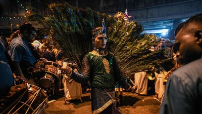 A Hindu devotee dancing in a state of trance before heading towards the Batu Caves temple to make offerings during the Thaipusam festival in Batu Caves on the outskirts of Kuala Lumpur. AFP