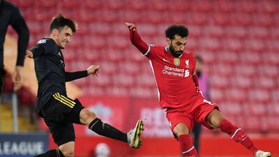 Liverpool' forward Mohamed Salah (R) vies with Ajax defender Nicolas Tagliafico. AFP
