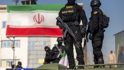 Members of the security forces police a pro-government rally in Tehran, Iran, on January 12, 2026. Getty Images