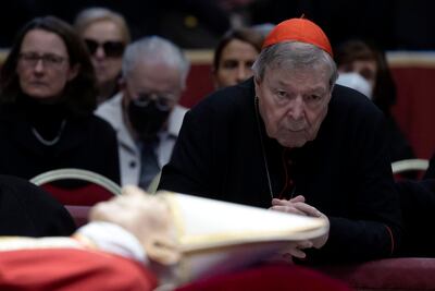 Australian Cardinal George Pell prays near the body of the late Pope Benedict XVI in the Saint Peter Basilica in Vatican City on January 3. EPA