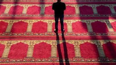 A worshipper at Friday prayers at the Kashmiri Masjid in Kathmandu, Nepal. EPA