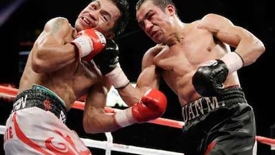Juan Manuel Marquez, right, wants a rematch with Manny Pacquiao.