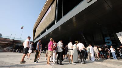Fans queue to see the ceremonial weigh-in at UFC 308.