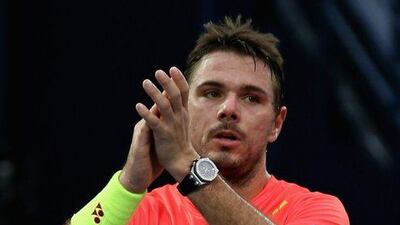 DUBAI, UNITED ARAB EMIRATES - FEBRUARY 26: Stan Wawrinka of Switzerland acknowledges the crowd after winning his semi final match as Nick Kyrgios of Australia retires injured on day seven of the ATP Dubai Duty Free Tennis Championship at the Dubai Duty Free Stadium on February 26, 2016 in Dubai, United Arab Emirates. (Photo by Warren Little/Getty Images)