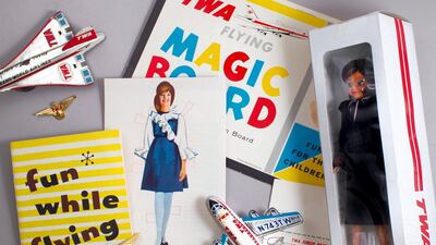 Memorabilia on display at the TWA Hotel includes airplane models, flight crew dolls and original books that were distributed to children on flights. Courtesy TWA Hotel