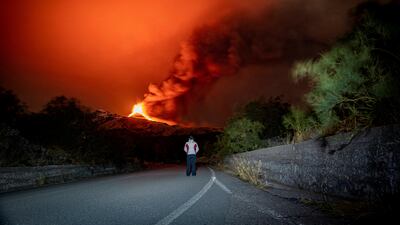 Volcanic eruptions from Mount Etna light up the night sky in Catania, Italy. Reuters