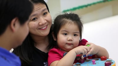 Two-year-old Hana Sarmiento was born deaf and had a cochlear implant put in at the HearLife clinic in Dubai. Pawan Singh / The National