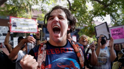 Fan Robert Bordelon cheering after the judgement. EPA