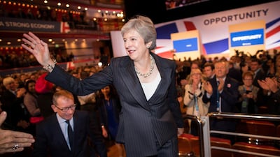 Britain's Prime Minister Theresa May has promised to reduce low-skilled immigration, but that is not the UK's biggest problem. AFP/Stefan Rousseau