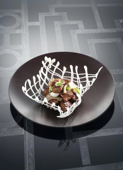 Osmanthus Wagyu beef rib eye is a signature dish of chef Andy Toh.