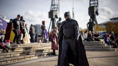 A cosplayer dressed as Batman. EPA
