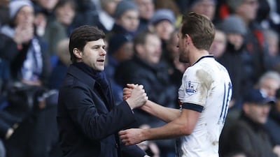 Tottenham manager Mauricio Pochettino shakes hands with Harry Kane on Saturday during Spurs' Premier League win at White Hart Lane. Paul Childs / Action Images / Reuters / January 16, 2016