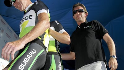 Former Cycling Australia co-ordinator Matt White (r) with Orica-GreenEdge rider Stuart O'Grady.