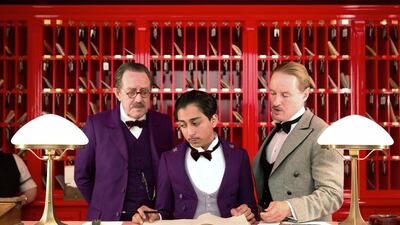 Tom Wilkinson, Tony Revolori, centre, and Owen Wilson, right, in The Grand Budapest Hotel. Fox Searchlight / AP Photo