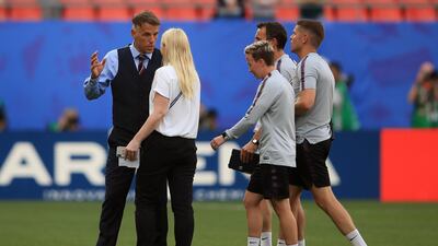 England manager Phil Neville, left, has heavily criticised the behaviour of his side’s opponents. Marc Atkins / Getty Images