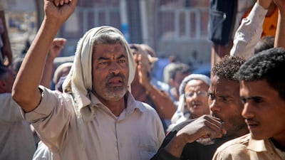 Opposers of Yemen's Houthi rebels shout slogans during a rally in support of the United States and the outgoing Trump administration's decision to apply the "terrorist" designation to the Iran-backed movement, in Yemen's third city of Taez. AFP