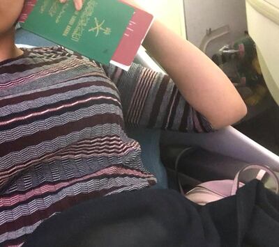 Rahaf Alqunun tweeted a photo of her passport from her plane seat. Social Media