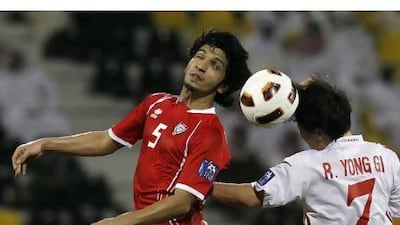 Amer Abdulrahman, left, the talented midfielder, was unhappy with the way he played in UAE's game against the North Koreans. Hassan Ammar / AP Photo