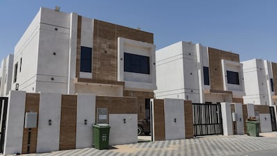 Villas in Ajman's Al Zahya neighbourhood. The emirate has been bolstering regulations to attract more investors into its real estate sector. Antonie Robertson / The National