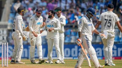 New Zealand's Aijaz Patel, third left, celebrates the dismissal of Ravindra Jadeja. AP