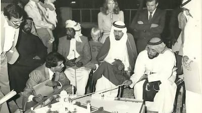 Frauke Heard-Bey stands behind Sheikh Zayed in 1980. Her husband, David, is on the left, along with her two kids. Photo courtesy of Frauke Heard-Bey.