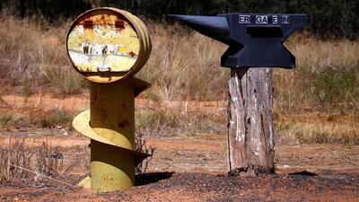 An old oil drum and an anvil in Walgett.