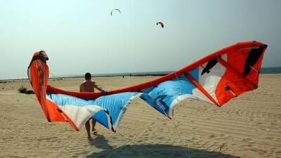 A kitesurfer ready to hit the water at the dedicated stretch of Jumeirah Beach in Dubai.