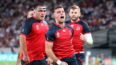 England's George Ford celebrates after scoring a try during the Rugby World Cup Pool C game against Argentina at the Tokyo Stadium. AP