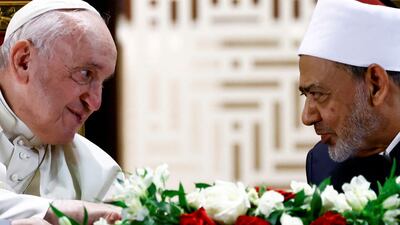 Pope Francis and Grand Imam of Al-Azhar Ahmed Al-Tayeb look each other as they attend a meeting with members of the council of elders at the courtyard of the Mosque of Sakhir Palace during Pope Francis' apostolic journey, in south of Manama, Bahrain. Reuters