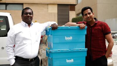 Premlal PK and Abraham Thomas, co-founders of Kuwait City-based company Boxit in front of the company's "transit warehouse" in Kuwait City. Justin Vela/The National