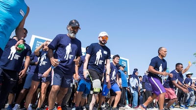 Tareq who lost his legs during an accident is participating in the run at the Terry Fox Run, Corniche Beach.
