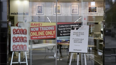 A sign for contactless service outside a store during a lockdown in Melbourne, Australia. The city is ordering residents to stay home for the fourth time since the pandemic began as the return of infections tests the country's zero-tolerance approach to the virus. Bloomberg