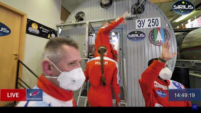 Team members wave goodbye as they enter the unit.